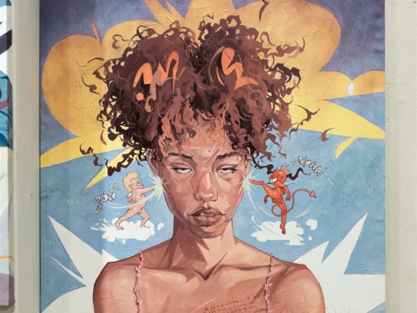 Pintura original de Jazzy Dope, rostro resuelto con trazo suelto en rojos y grises. Obra "Es fácil de entender si te ha pasado".