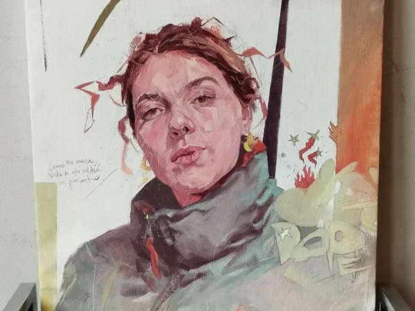 Pintura figurativa de Jazzy Dope, rostro fragmentado entre rojos y ocres. Obra "Cuando me muera nada de esto valdrá un pimiento".